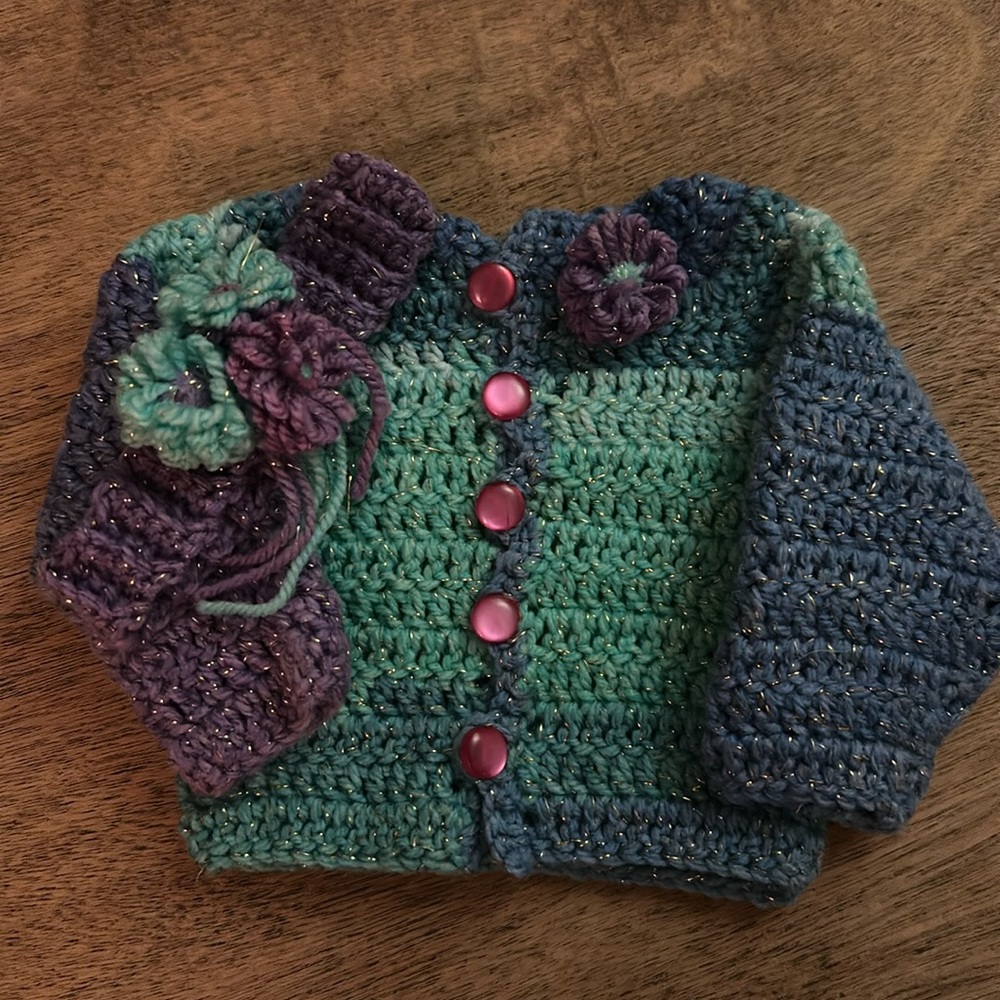 Beautiful hand knitted sweater with matching headband. Multi colors